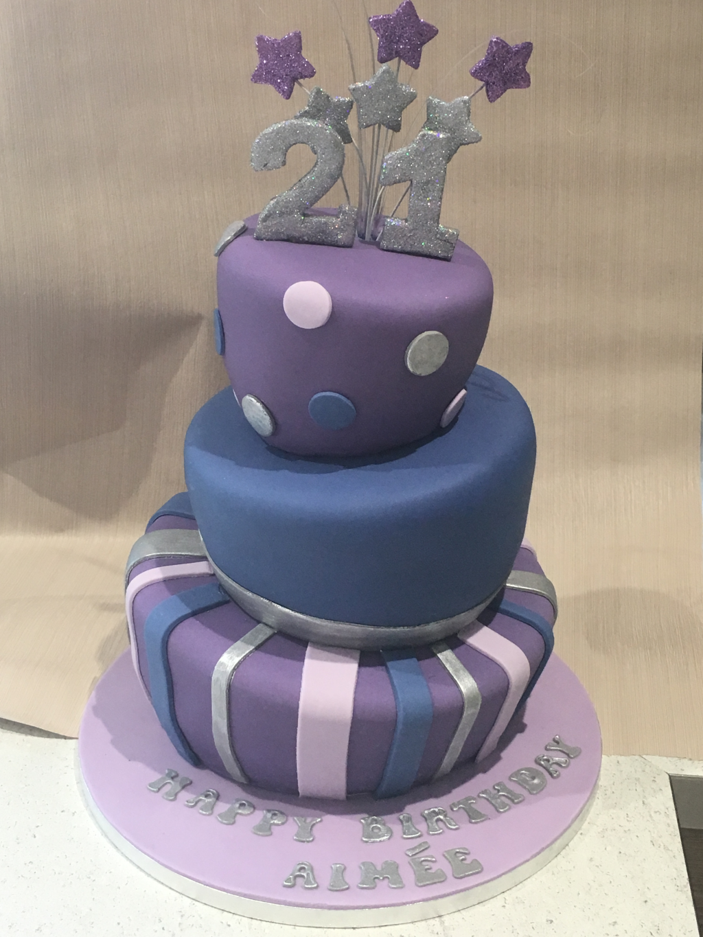 Topsy-turvy-purple-and-silver-cake
