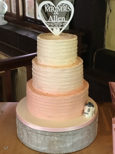 Ombre-pink-buttercream-wedding-cake-with-R2D2-model